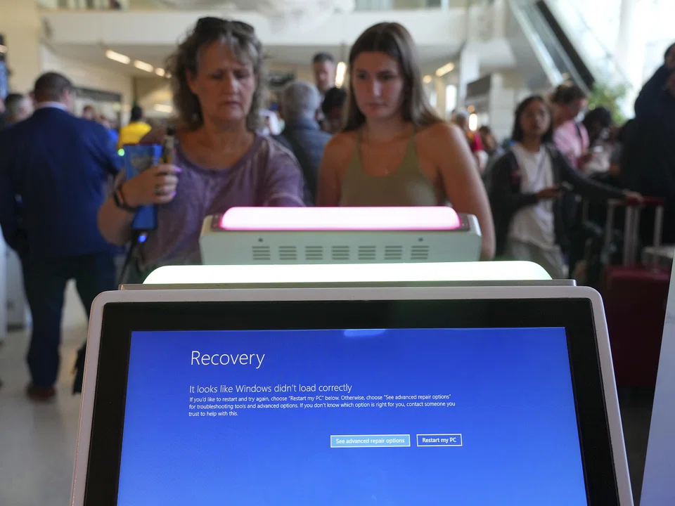 Passenger crowds had swelled at airports on Friday as dozens of flights were cancelled after an update to a programme operating on Microsoft Windows crashed systems worldwide.