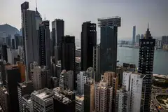 Commercial and residential buildings are seen in Hong Kong on September 15, 2022. - The amount of vacant top-tier office space has more than doubled in Hong Kong over the last three years as companies downsize operations, researchers have found, warning that demand could remain soft even if pandemic controls are lifted. (Photo by ISAAC LAWRENCE / AFP)