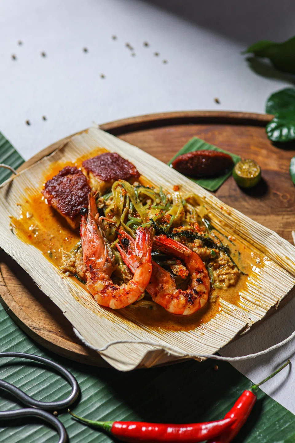 Laksa fettucine is a heavy-going, spicy prawn noodle dish.