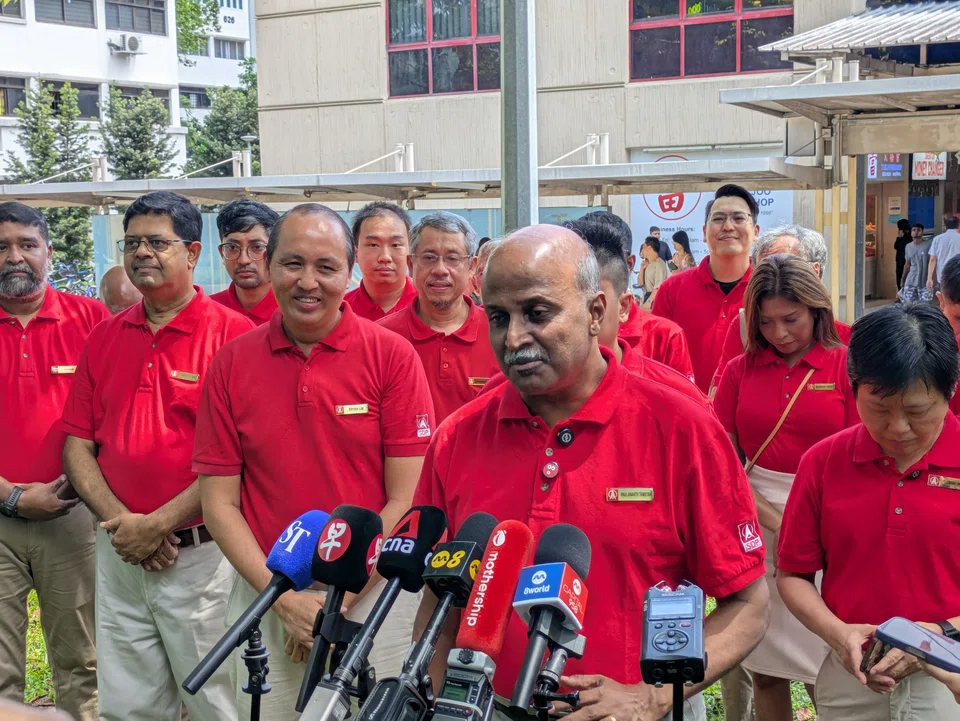 SDP chairman Paul Tambyah, flanked by vice-chairman Bryan Lim (left) and Marsiling-Yew Tee GRC candidates Dr Gigene Wong (right) and Jufri Salim (not pictured), led the party’s manifesto announcement.