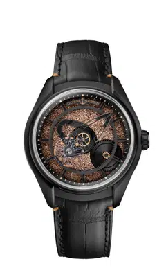 The Freak X Crystalium is a limited-edition watch with a rotating hour disc made of Crystalium, a unique material with a rose gold PVD finish.