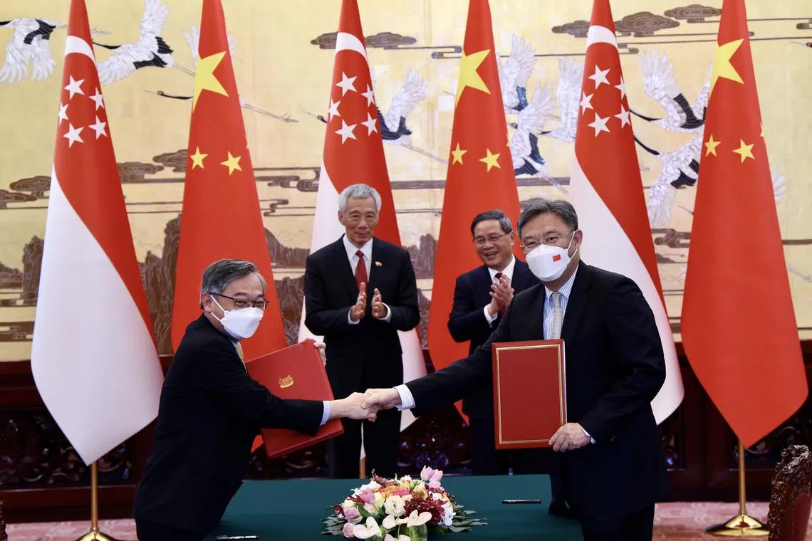 From left: Minister for Trade and Industry Gan Kim Yong; then-PM Lee Hsien Loong; Chinese Premier Li Qiang; and Chinese Minister of Commerce Wang Wentao in Beijing in April 2023. DPM Gan was accompanying former PM Lee on an official visit to China at the time. 