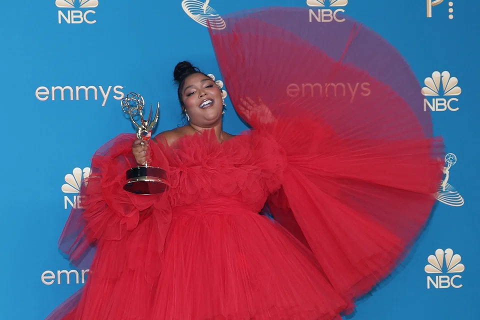 Lizzo poses with her award for Outstanding Competition Program for "Lizzo's Watch Out for the Big Grrrls" at the 74th Primetime Emmy Awards held at the Microsoft Theatre in Los Angeles, Sept 12, 2022. 