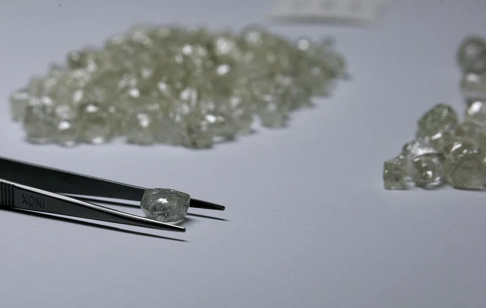 Diamonds are displayed at the De Beers Global Sightholder Sales in Botswana. Dealers say the price of mined, natural rough diamonds have fallen by an estimated 20 per cent to 30 per cent this year alone.