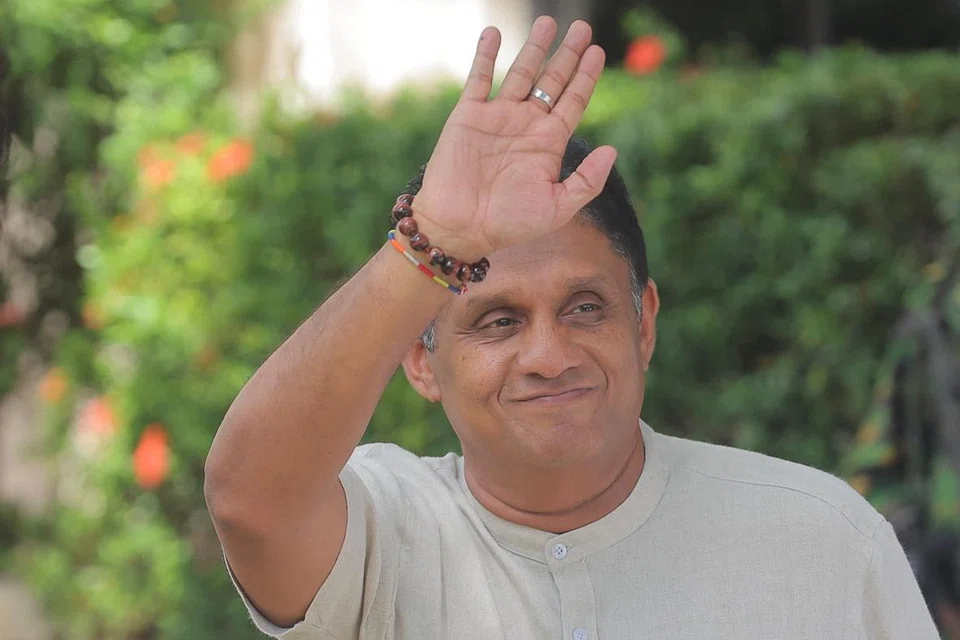 Sajith Premadasa, leader of the Samagi Jana Balawegaya party, arrives at the Election Commission in Rajagiriya to submit his nomination papers.