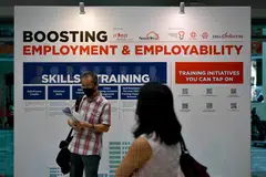 Above: A job fair in Yew Tee Community Club. Individuals and companies can use the report to identify skills gaps and invest in skills, amid the fast-changing landscape, says Minister of State for Education and Manpower Gan Siow Huang.