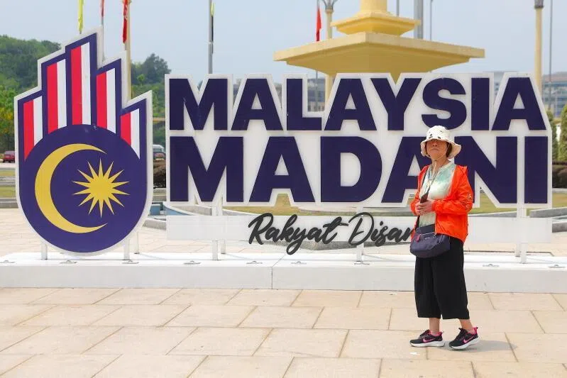 A tourist taking pictures of the Prime Minister's Office in Putrajaya. Claims of a "corporate mafia" involving the anti-graft agency and several individuals raise concerns over governance credibility.
