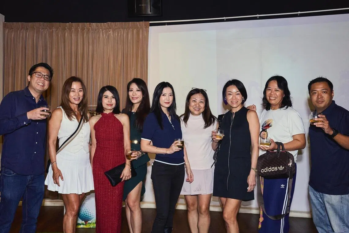 Pernod representatives  Bernard Poh (left) and Samuel Koh (right) with Hugo Boss members Li Anne Fones, Marilyn Lum, Stephanie Lee and Ferlyn Wong, and Adidas members Eunice Seah, Bonita Pang and Tan Ying Sze.