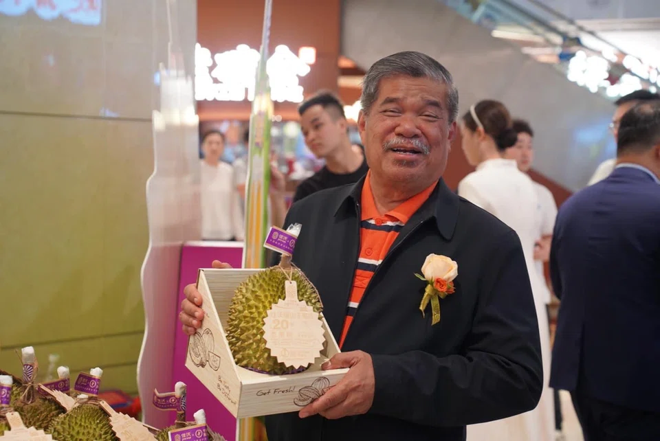 Malaysia Agriculture and Food Security Minister Mohamad Sabu at the durian packaging and distribution warehouse in Shenzhen, China. The retail price of the fresh Musang King is priced at RM350 per fruit in Shenzhen.