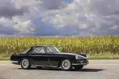 The black coupe with wire-spoke wheels is the 11th of the 353 of its kind built from 1955 to 1960, according to the sale catalogue.