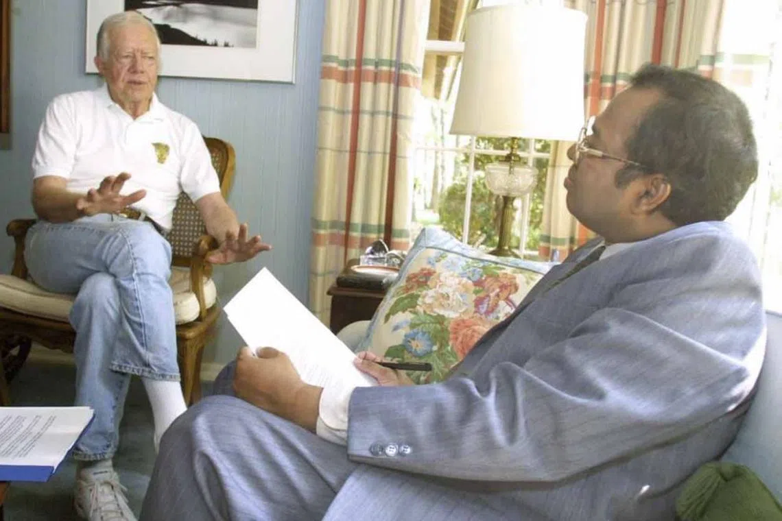 The writer interviewing President Carter at his home in Plains, Georgia, in July 2001.