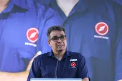 RDU secretary-general Ravi Philemon speaking during the party's first election rally at Bukit View Secondary School in Bukit Batok on April 26.