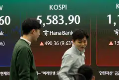 The benchmark South Korea Composite Stock Price Index (Kospi) rose 490.36 points, or 9.63%, to close at 5,583.90.  