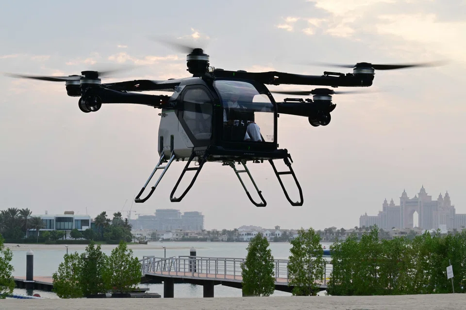 The modular Aridge X3-F (Air Module of the Land Aircraft Carrier) by China's flying car maker Aridge hovers during its presentation and flight demonstration in Dubai on Oct 12.
