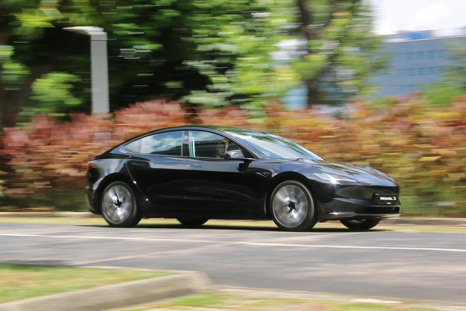 The Model 3 has slender new headlamps and a resculpted nose that give it a cleaner, more purposeful look. 