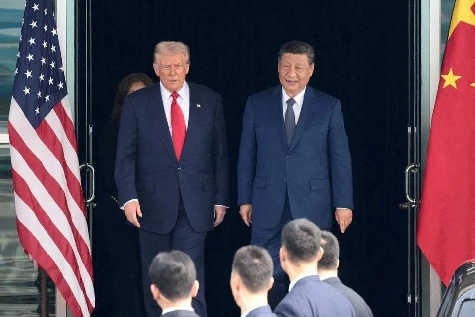 US President Donald Trump and Chinese President Xi Jinping leaving a bilateral meeting in Busan, South Korea, in October 2025.