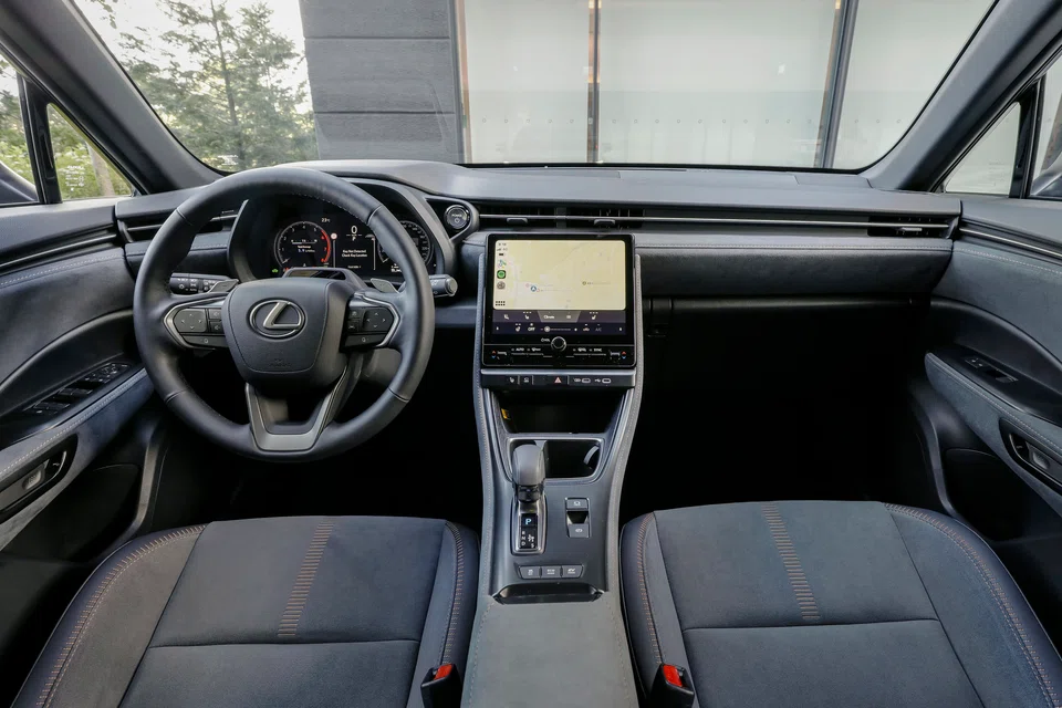 The LBX has clear digital driver displays and a 9.8-inch touchscreen within easy reach.
