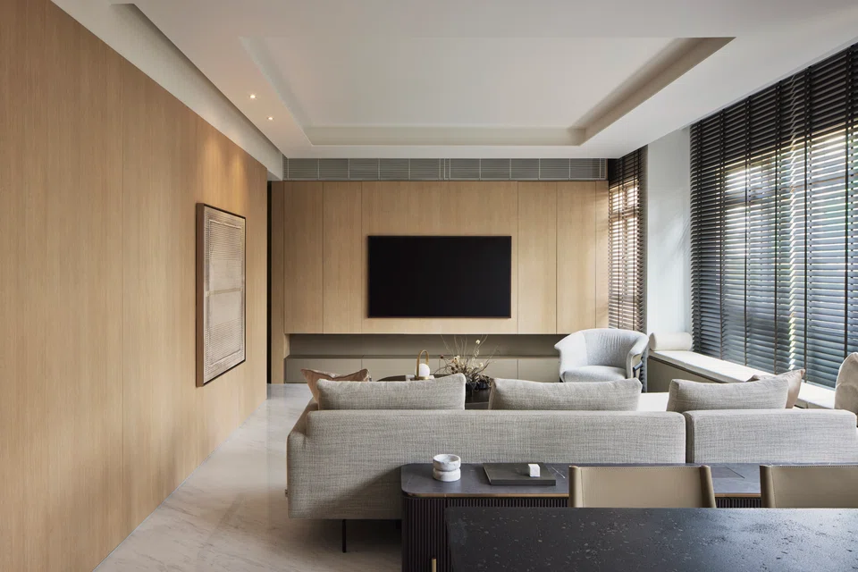 The living room is a favourite gathering space of the owner and his children and grandchildren. 