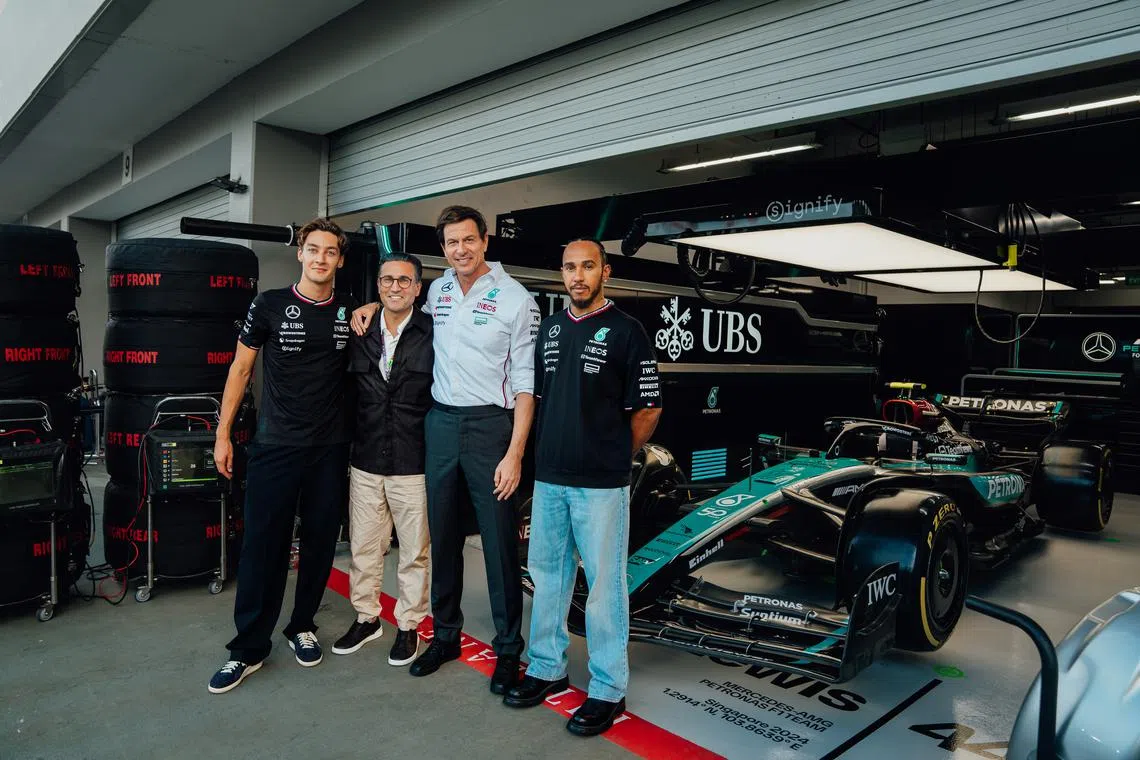 (From left) F1 driver George Russell, UBS Asia-Pacific president Iqbal Khan, Mercedes-AMG Petronas F1 team principal Toto Wolff, and F1 driver Lewis Hamilton.