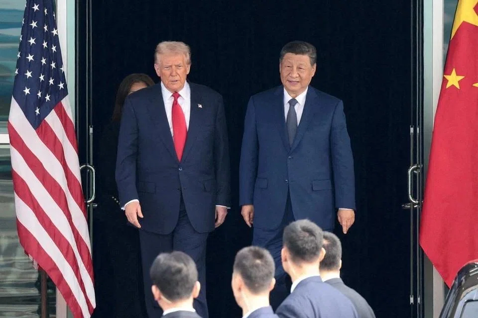 US President Donald Trump and Chinese President Xi Jinping leaving a bilateral meeting in Busan, South Korea, in October 2025.