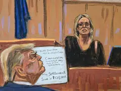 Former US President Donald Trump watches as Stormy Daniels is questioned by prosecutor Susan Hoffinger during Trump's criminal trial on charges that he falsified business records to conceal money paid to silence porn star Stormy Daniels in 2016, in Manhattan state court in New York City, May 7, 2024 in this courtroom sketch. 