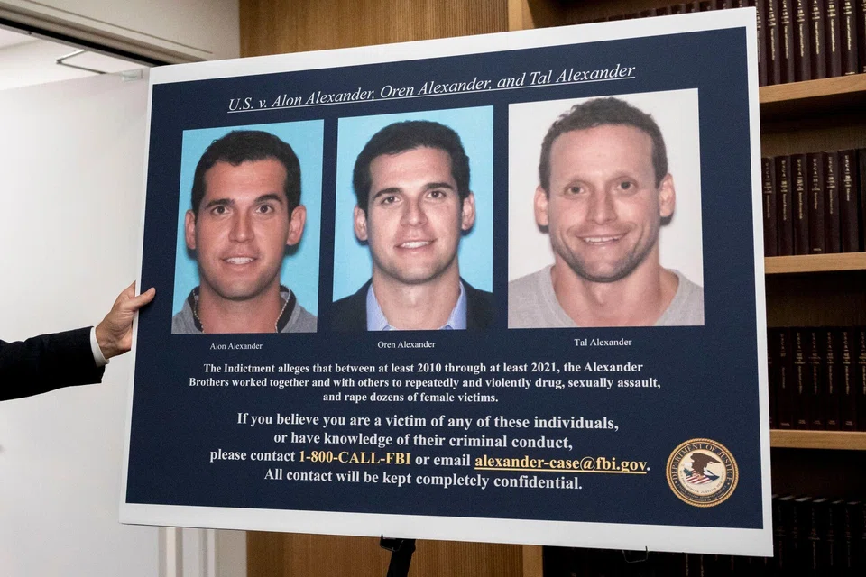 Images of Alon, Oren and Tal Alexander are displayed at a news conference in New York, US, Dec. 11, 2024. Luxury real estate brokers Oren and Tal Alexander and their brother Alon were arrested and charged with sex-trafficking by federal prosecutors in New York on Wednesday. 