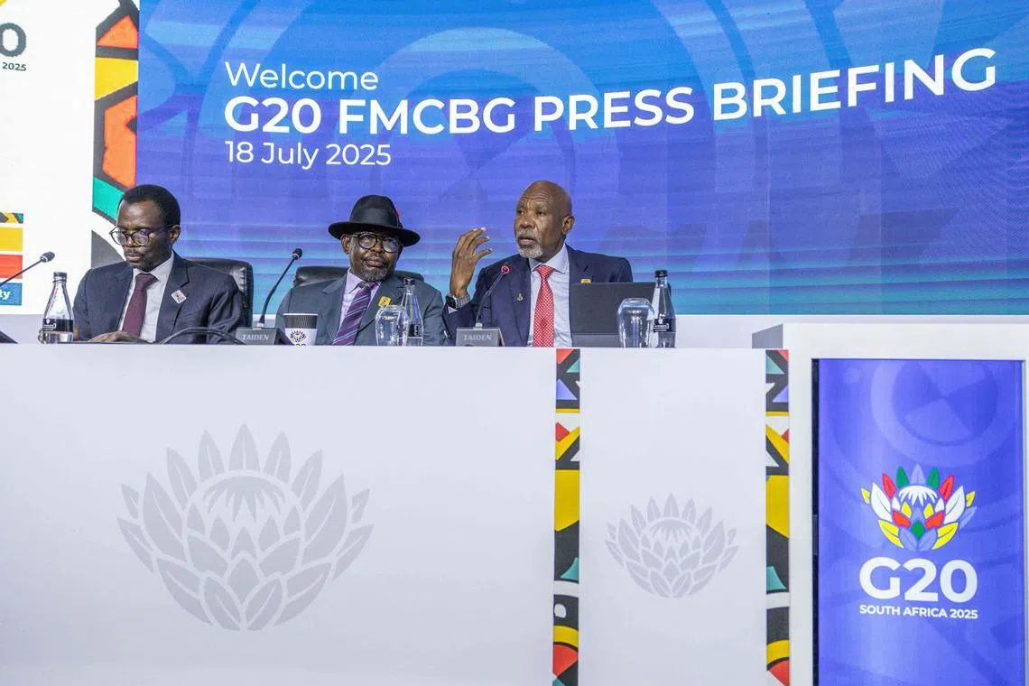 (From left) South Africa's Deputy Minister of Finance David Masondo, South Africa's Minister of Finance Enoch Godongwana and South African Reserve Bank Governor Lesetja Kganyago address the closing press conference on the last day of the G20 Finance Ministers and Central Bank Governors meeting, Durban, South Africa, July 18, 2025. 