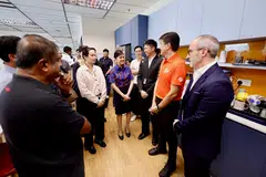 Labour chief Ng Chee Meng (second from right) says he met the affected Jetstar Asia workers at Terminal 1 on Wednesday, where they shared their concerns and uncertainties.