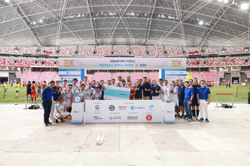 Singapore Pools' Weekend With A Heart included football matches, games and exercise activities at the National Stadium.