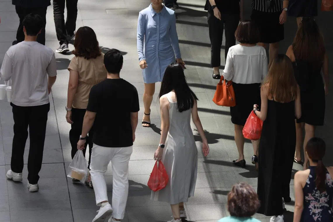 Generic image of Singaporeans carrying plastic disposables to takeaway food. Can be used for environmental stories and sustainability among Singaporeans.