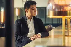 Until recently, Zach Lee has stayed under the radar. He wears a shirt from Boss, and overshirt and jeans from Zegna.