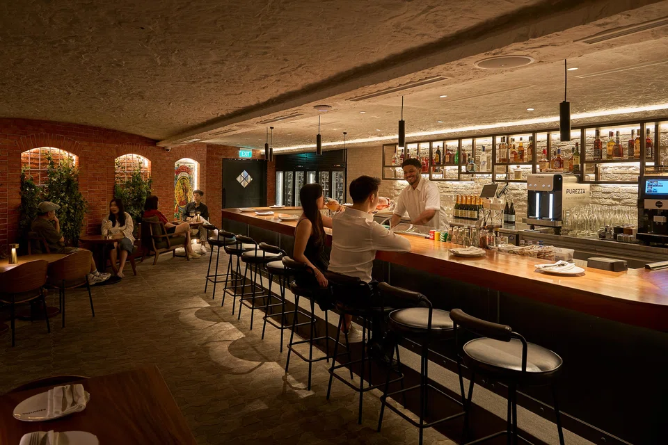 MoVida's low-ceiling interiors resemble a rustic wine cellar.