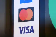 Both Visa and Mastercard agreed to relax their controversial “honour all cards” rules, which required merchants to accept all Visa or Mastercard credit cards if they accept any cards from the two networks. 