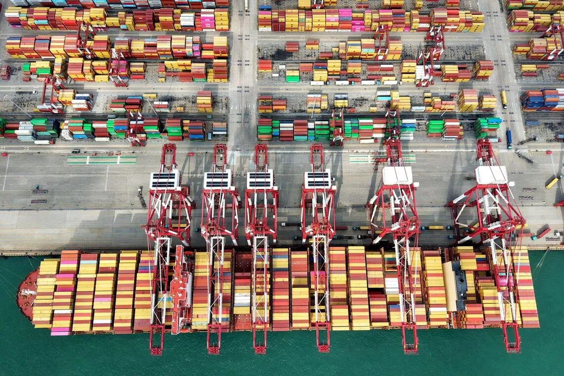 A ship at a port in Qingdao, China, on Oct 9, 2025. Chinese exports have hit new records in many markets this year, showing Beijing can survive without the US consumer.