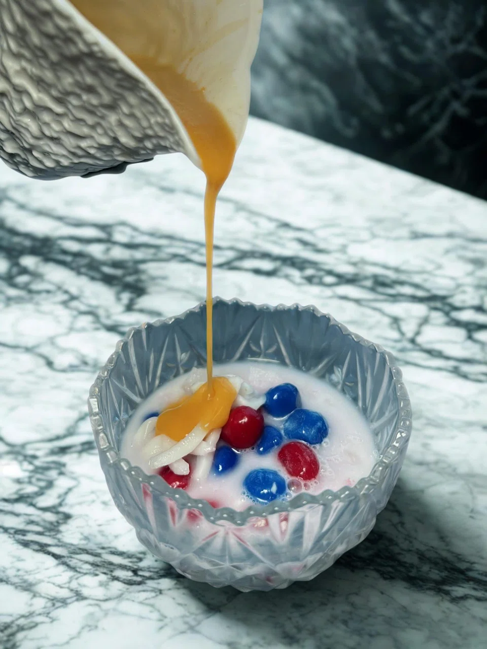 Bua loy features glutinous rice balls in coconut milk.