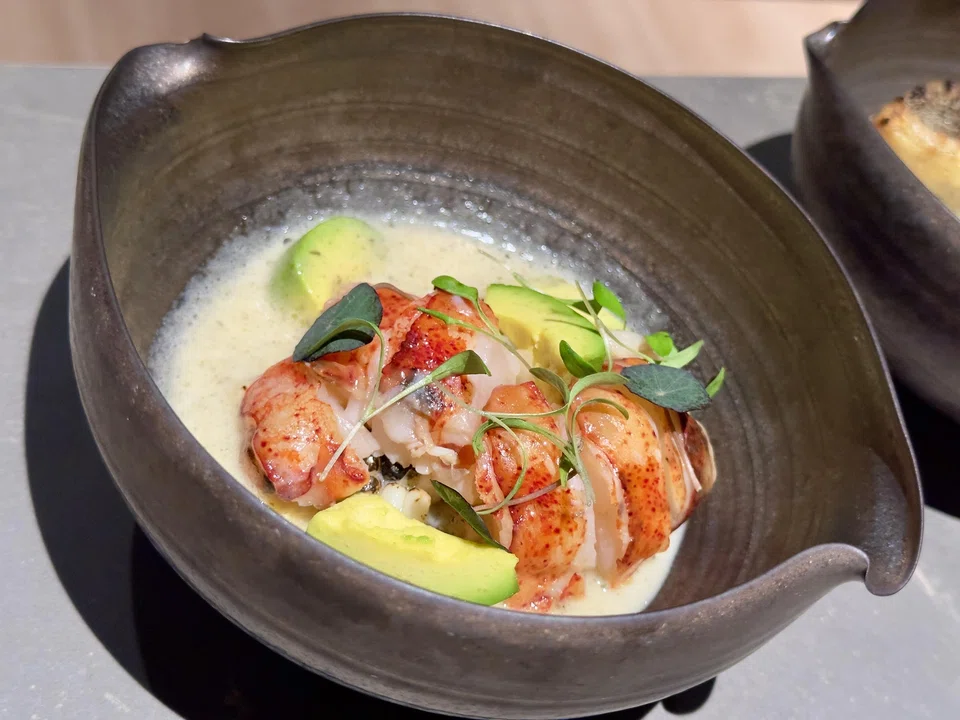 Lobster and avocado in potato soup.