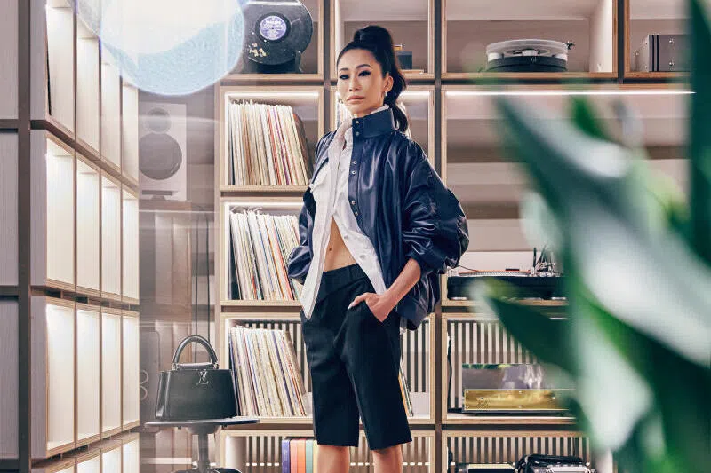  Naphaporn “Lek” Bodiratnangkura, CEO of the Nai Lert Group, is the driving force behind Aman Nai Lert Bangkok, Aman’s new outpost.  She wears a white shirt, black shorts, bomber jacket, Legacy pumps and black Capucines leather bag, all from Louis Vuitton.
