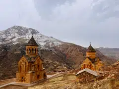 Noravank Monastery, built in the 13th century, is situated in a narrow gorge of the Amaghu River in Armenia. The churches’ conical roofs were added during a more recent restoration in the late 1990s.
