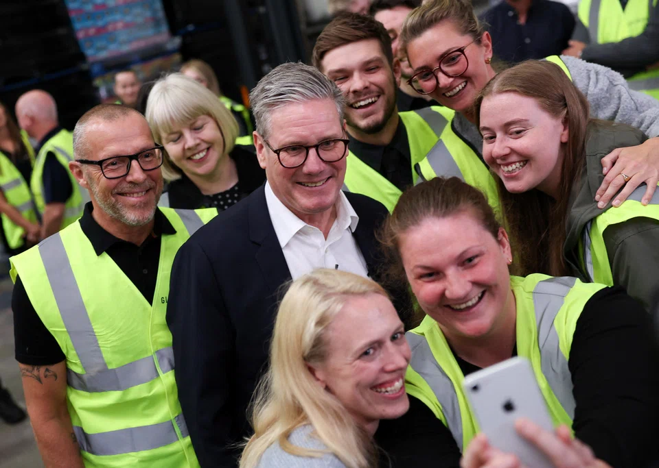 British opposition Labour Party leader Keir Starmer poses for a picture during a campaign event in Clay Cross, Britain, July 2, 2024. Survation said its data indicated that Labour would win around 42 per cent of the overall vote, ahead of the Conservatives on 23 per cent.
