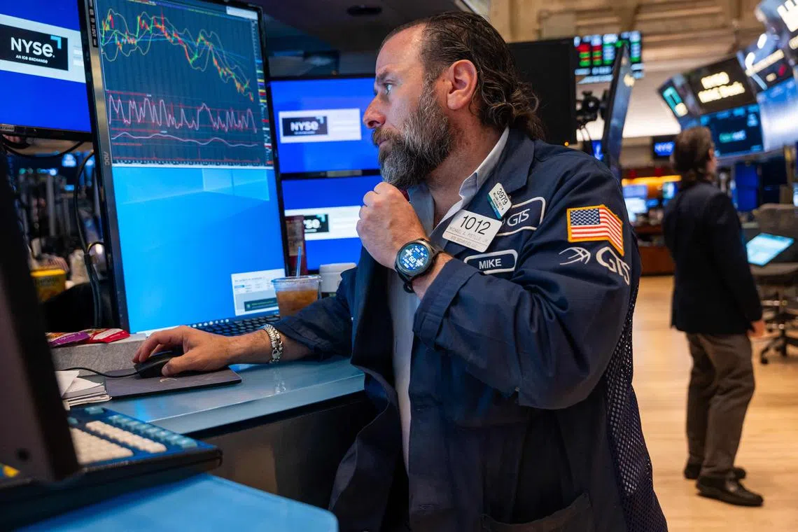 NEW YORK, NEW YORK - MAY 13: Traders work on the floor of the New York Stock Exchange (NYSE) on May 13, 2025 in New York City. Markets opened lower following the announcement that the Labor Department's Consumer Price Index (CPI) rose 0.2% on the month.   Spencer Platt/Getty Images/AFP (Photo by SPENCER PLATT / GETTY IMAGES NORTH AMERICA / Getty Images via AFP)