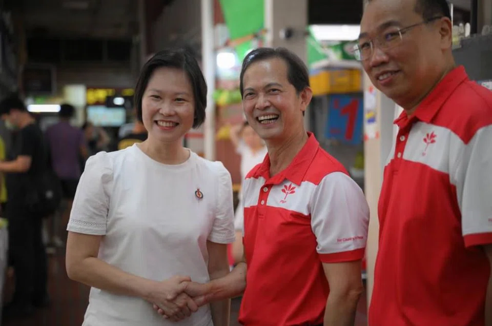 Leong Mun Wai (centre) of PSP meets Marymount SMC MP Gan Siow Huang (left) ahead of his walkabout on Saturday.