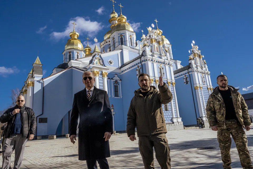 US President Joe Biden is escorted by President Volodymyr Zelenskyy of Ukraine as he visits St. Michael’s Golden-Domed Monastery in Kyiv, Ukraine’s embattled capital, on Monday Feb 20, 2023. 