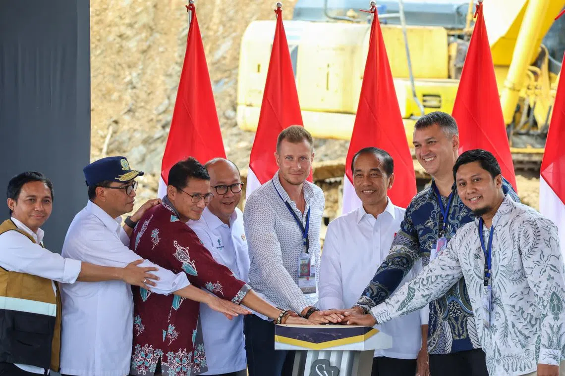 Indonesia President Joko Widodo (third from right) officially inaugurates the start of a Russia-backed construction project in the new capital city, Nusantara.