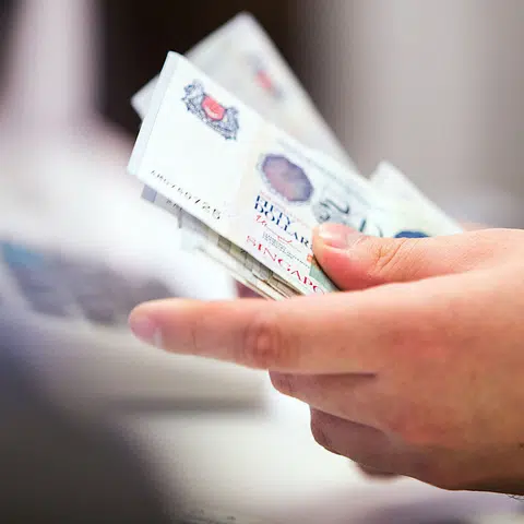 Latest Singapore six-month T-bill cut-off yield slides 