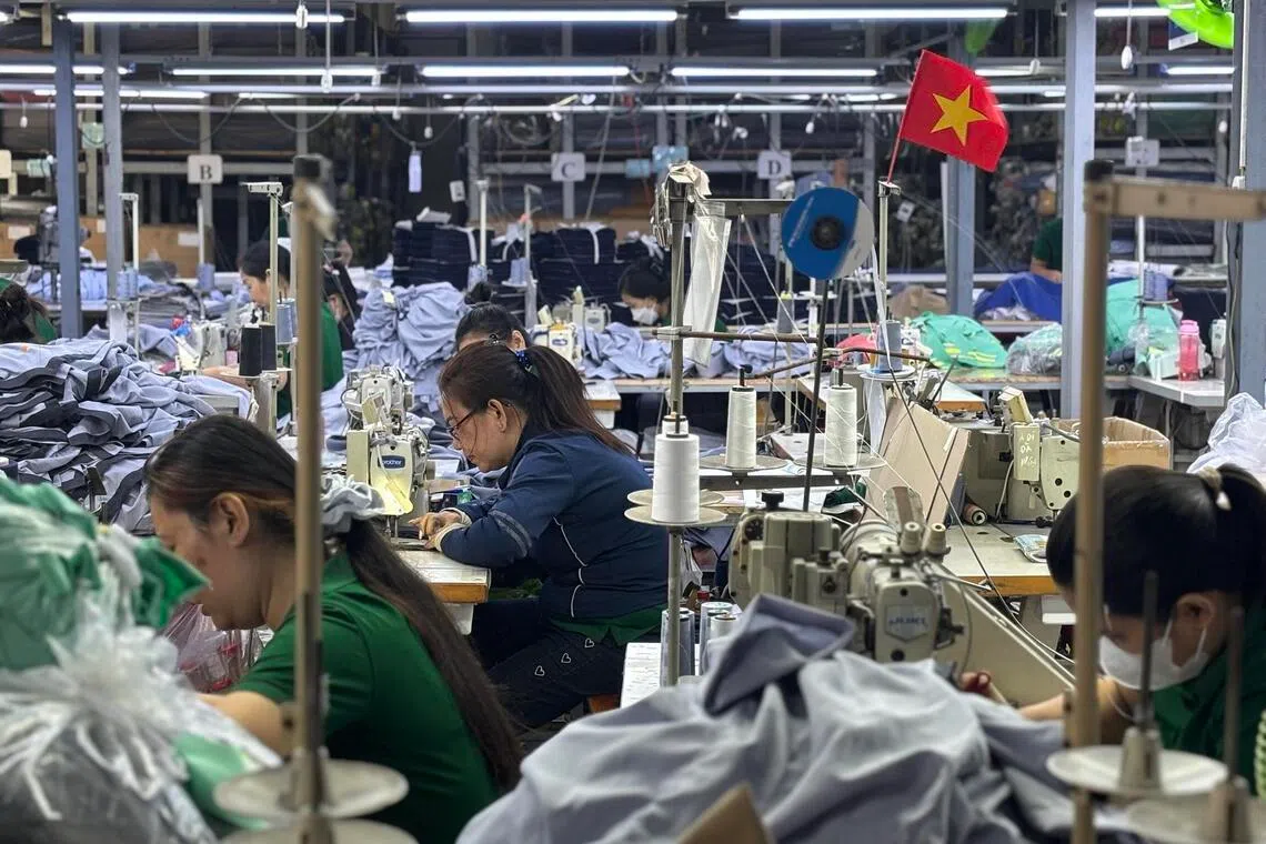 A garment factory in Ho Chi Minh City. Targets of the US probes include Vietnam, which had the largest trade surplus with the US in January.