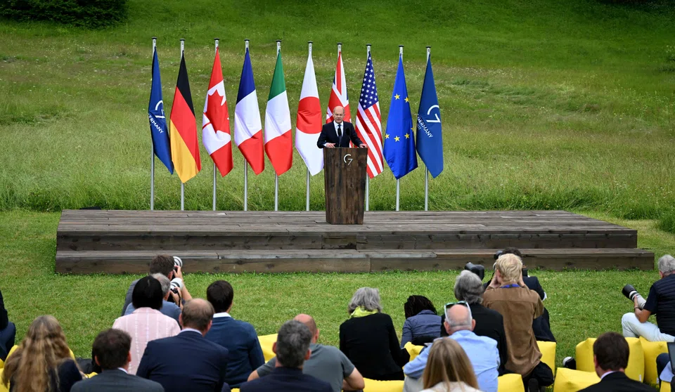Germany's Chancellor Olaf Scholz speaking on June 28, 2022 at Elmau Castle, southern Germany, at the end of the G7 Summit. (Photo by KERSTIN JOENSSON / AFP)