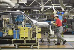 The July slump in industrial output is due partly to a 6.7 per cent decline in automobile production.