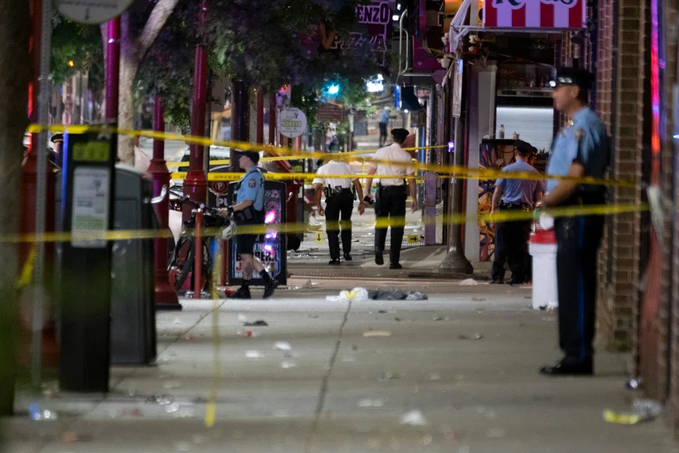 Multiple shooters opened fire in Philadelphia’s busy South Street, an area filled with bars and restaurants, around midnight on Saturday. Two men and a woman were killed.