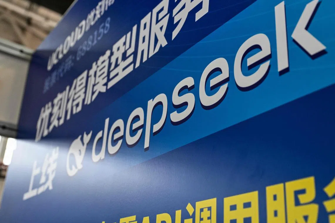 (FILES) The logo of Deepseek is seen during the Global Developer Conference, organised by the Shanghai AI Industry Association, in Shanghai on February 21, 2025. A simple handshake between President Xi Jinping and once-shunned entrepreneur Jack Ma sent Chinese tech stocks booming in recent weeks as it was interpreted as the latest sign the sector is being brought in from the cold -- though experts advise caution. (Photo by Hector RETAMAL / AFP)