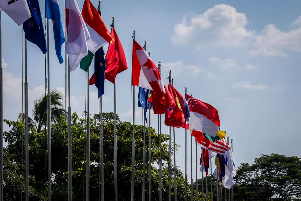 Asean country flags in Laos, ahead of last month's clutch of Asean summits. Total fintech investment into Asean stood at US$1.41 billion in the first nine months of 2024. 